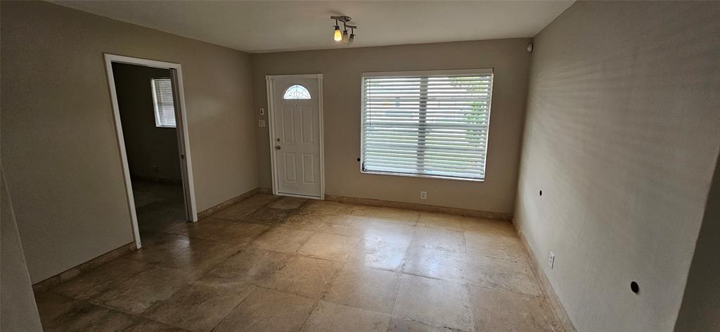 501 Northwest 65th Avenue Margate, FL 33063 - Photo 4 of 29 an empty room with windows and closet