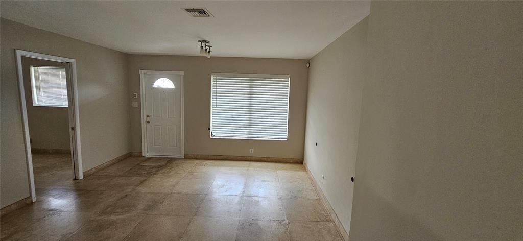 501 Northwest 65th Avenue Margate, FL 33063 - Photo 7 of 29 an empty room with windows and closet