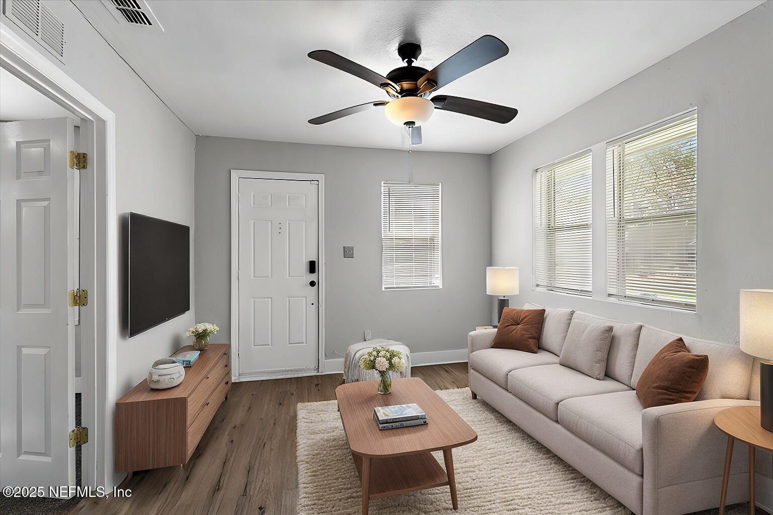 3607 Gilmore Street Jacksonville, FL 32205 - Photo 1 of 13 a living room with furniture and a flat screen tv