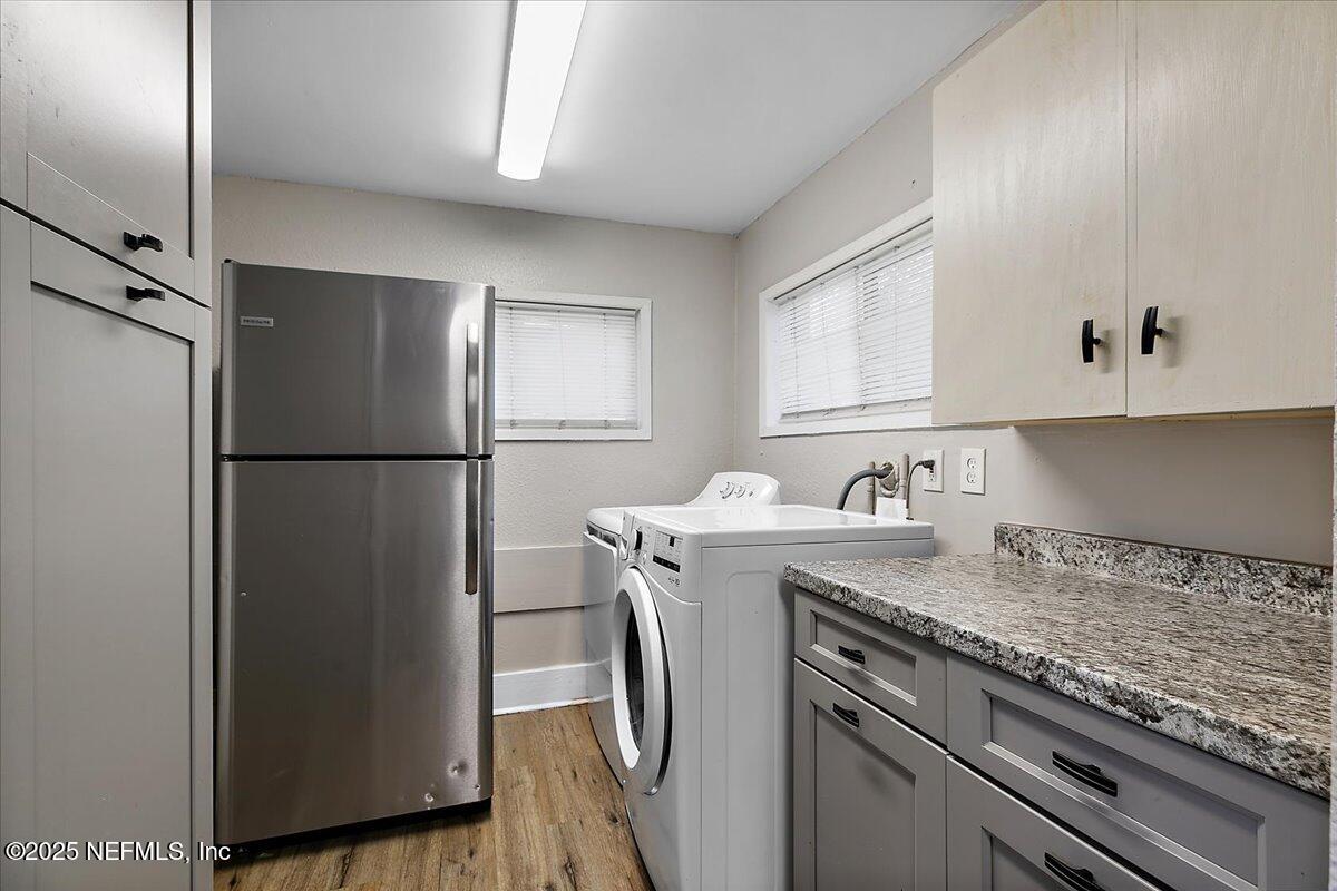 3607 Gilmore Street Jacksonville, FL 32205 - Photo 11 of 13 a kitchen with stainless steel appliances granite countertop a refrigerator and a sink