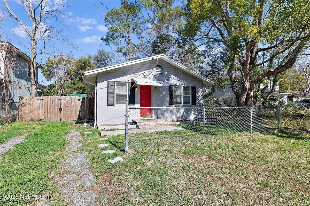 3607 Gilmore Street Jacksonville, FL 32205 - Photo 2 of 13 a view of a house with a yard and sitting area