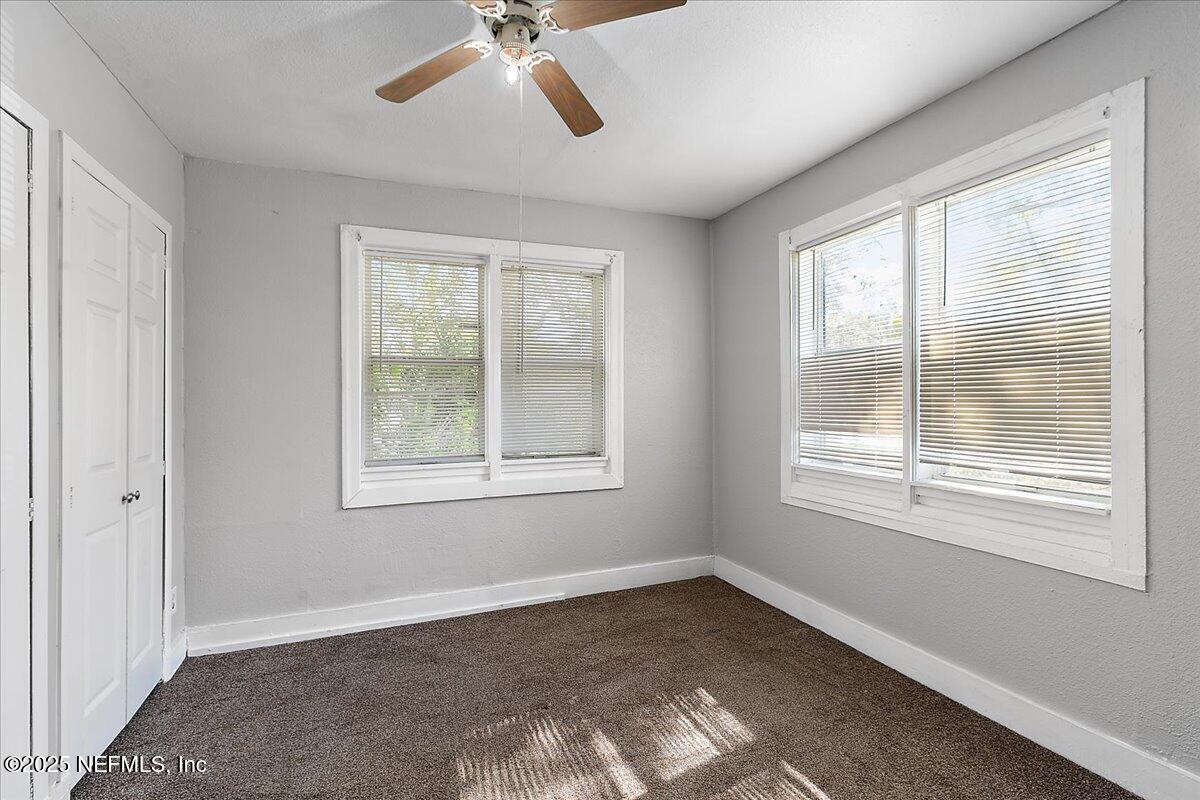 3607 Gilmore Street Jacksonville, FL 32205 - Photo 7 of 13 an empty room with a window
