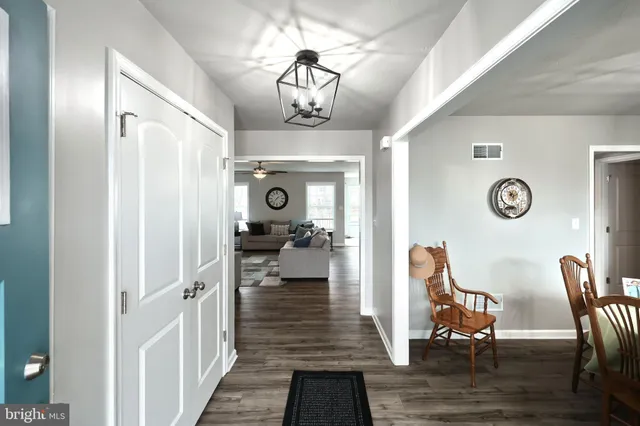 a very nice looking room with wooden floor