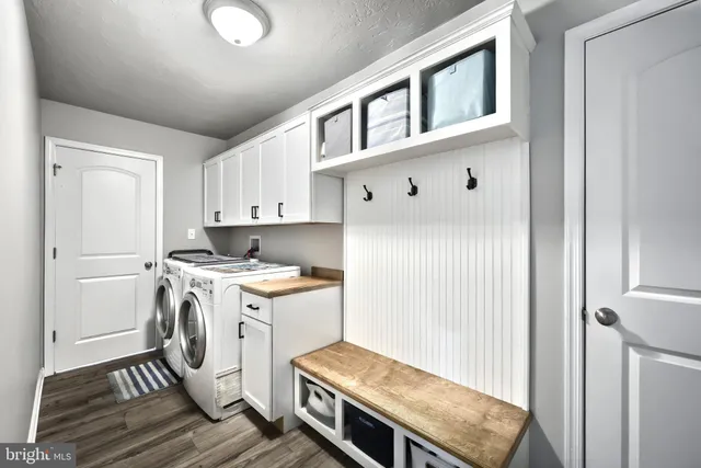 a kitchen with a stove and a refrigerator