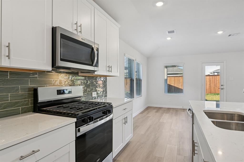 2231 Rannoch Street Sherman, TX 75092 - Photo 7 of 37 Photo is not of the actual home, but is an inspirational photo of builder’s model home and may depict options, furnishings, and/or decorator features that are not included.