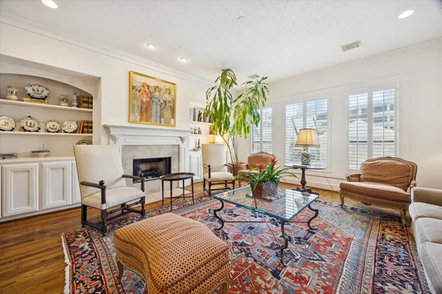 a large white kitchen with stainless steel appliances granite countertop lots of counter top space and cabinets