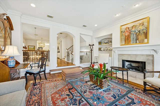 a kitchen with stainless steel appliances kitchen island granite countertop a refrigerator and microwave