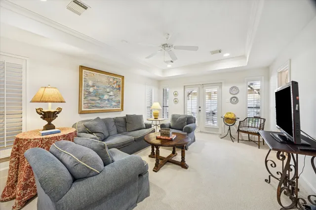 a view of entryway livingroom and hall with wooden floor