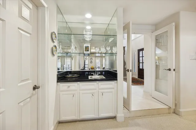 a dining room with furniture window and wooden floor
