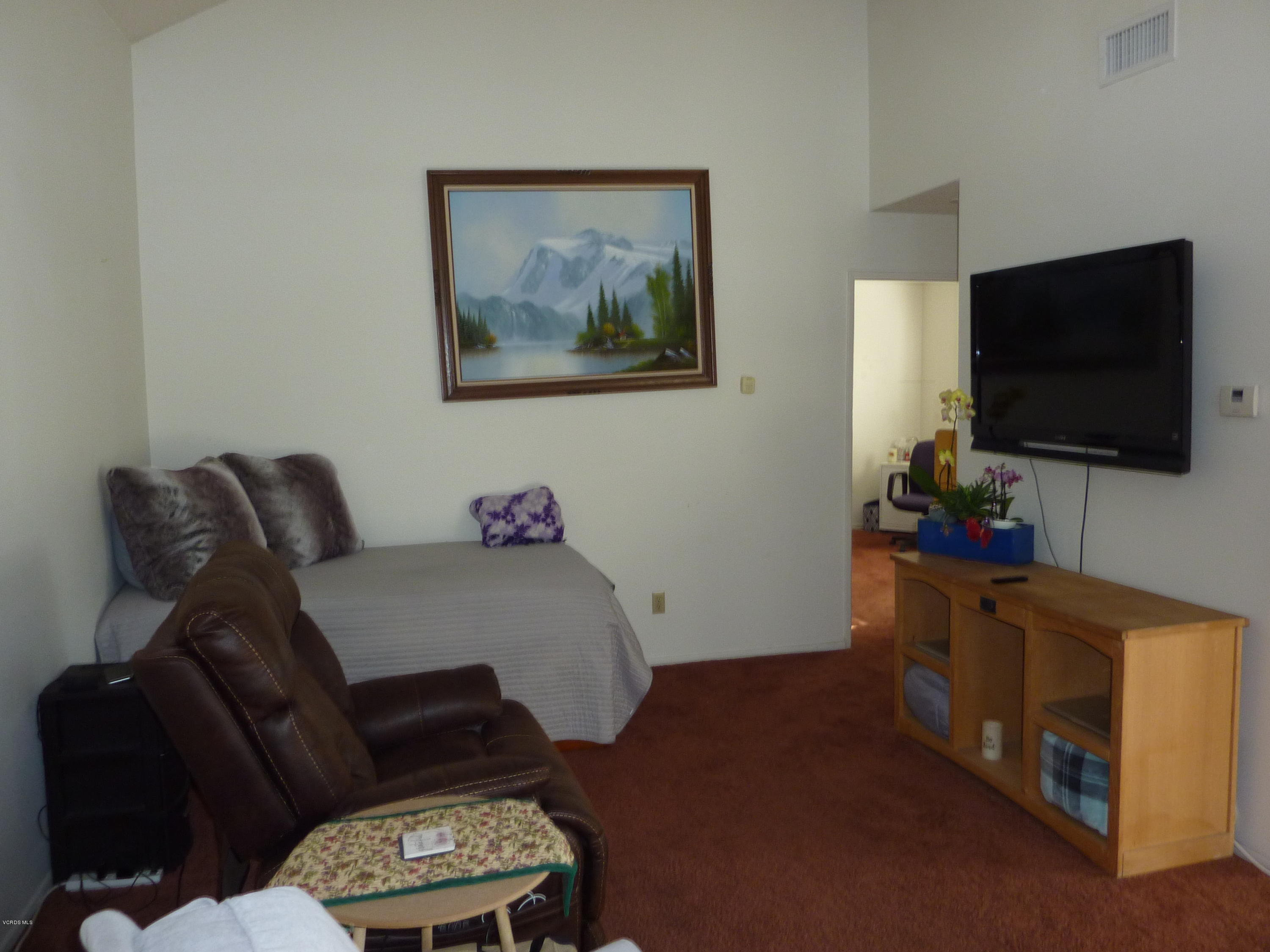 677 Arneill Road Camarillo, CA 93010 - Photo 15 of 40 a living room with furniture and a flat screen tv