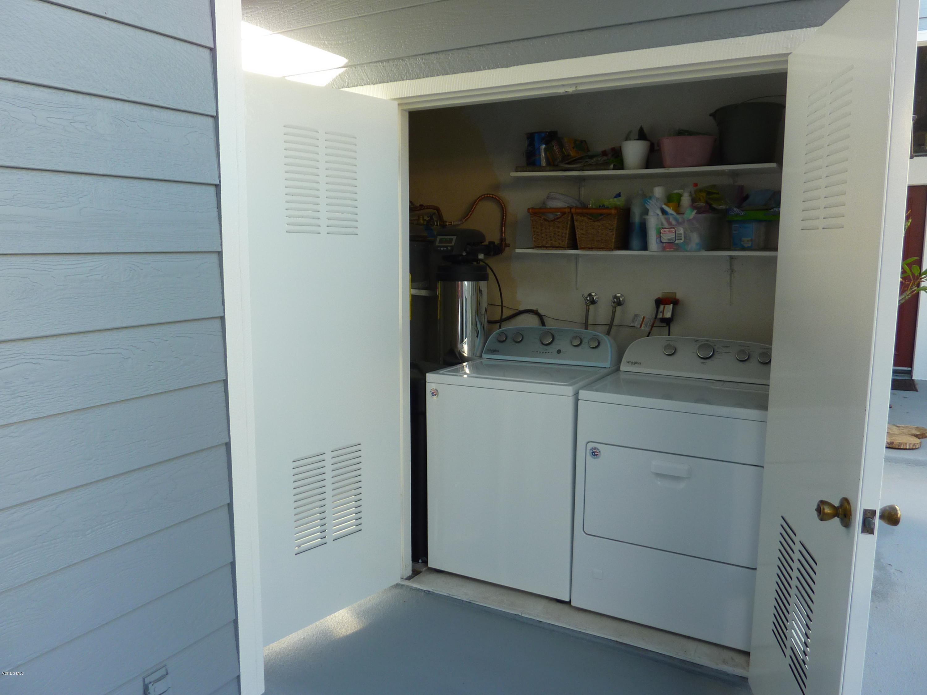 677 Arneill Road Camarillo, CA 93010 - Photo 28 of 40 a bathroom with a sink and cabinets