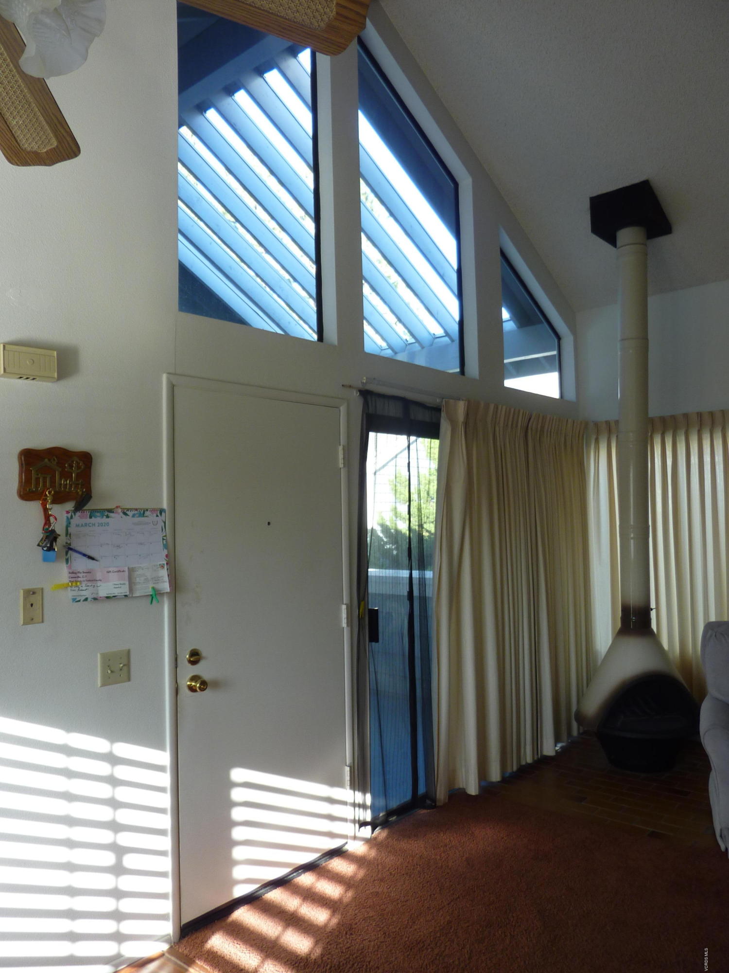 677 Arneill Road Camarillo, CA 93010 - Photo 10 of 40 a view of a room that has a bed and a window