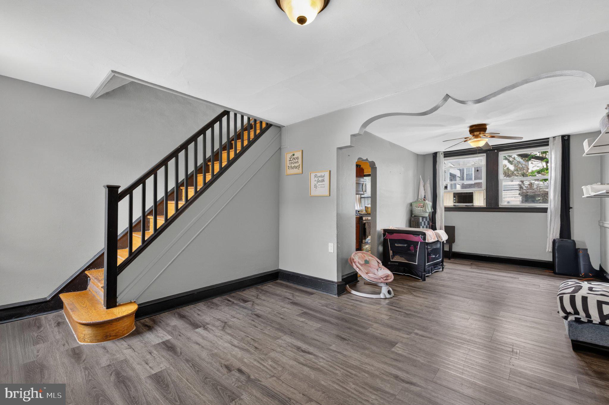 226 West Laveer Street Philadelphia, PA 19120 - Photo 8 of 23 a living room with furniture and a wooden floor