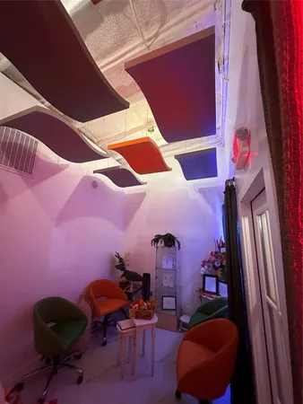 a room with furniture and carpet