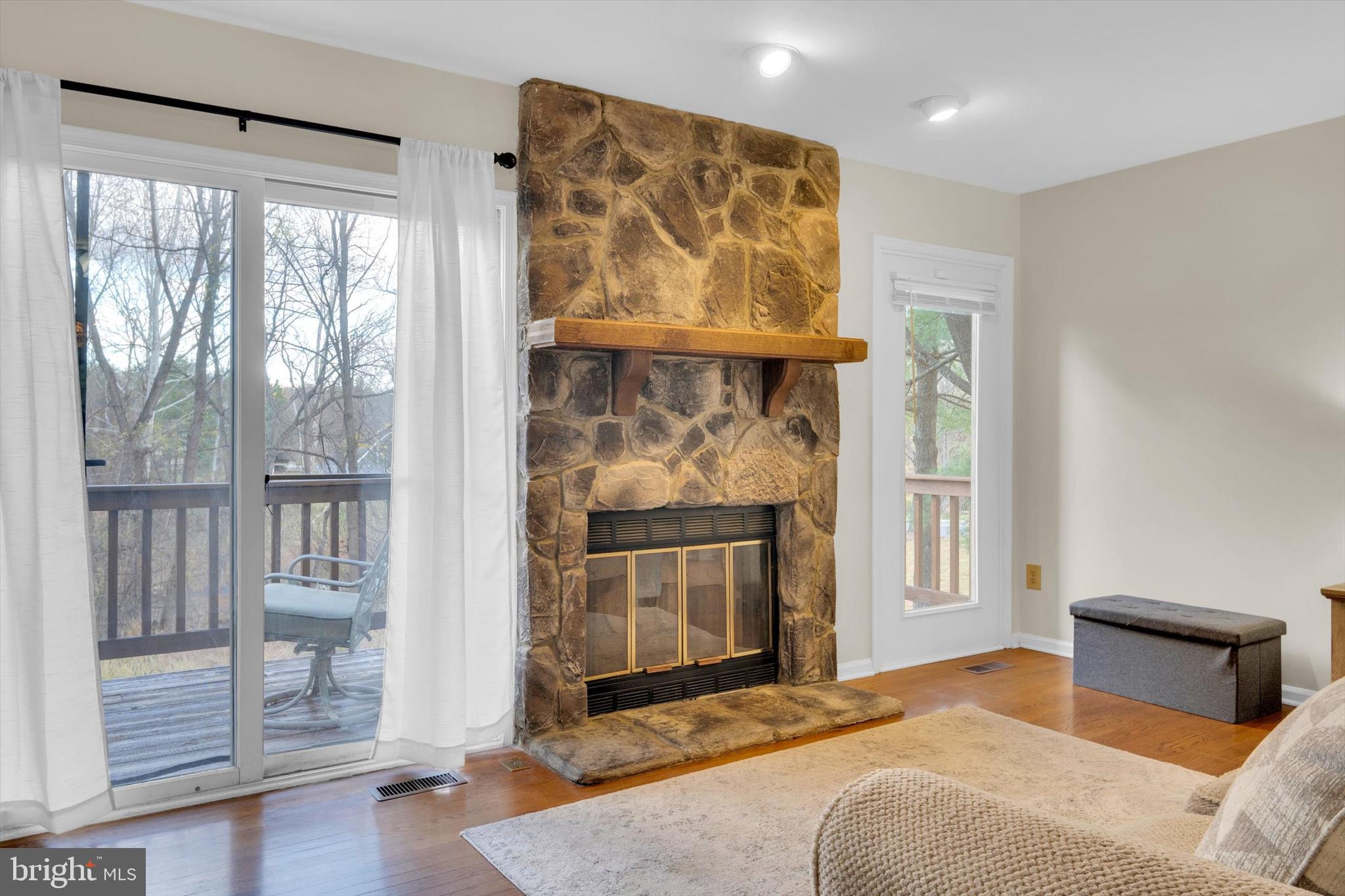 13201 Valley Bridge Court Silver Spring, MD 20906 - Photo 15 of 42 a bedroom with a bed and a fireplace
