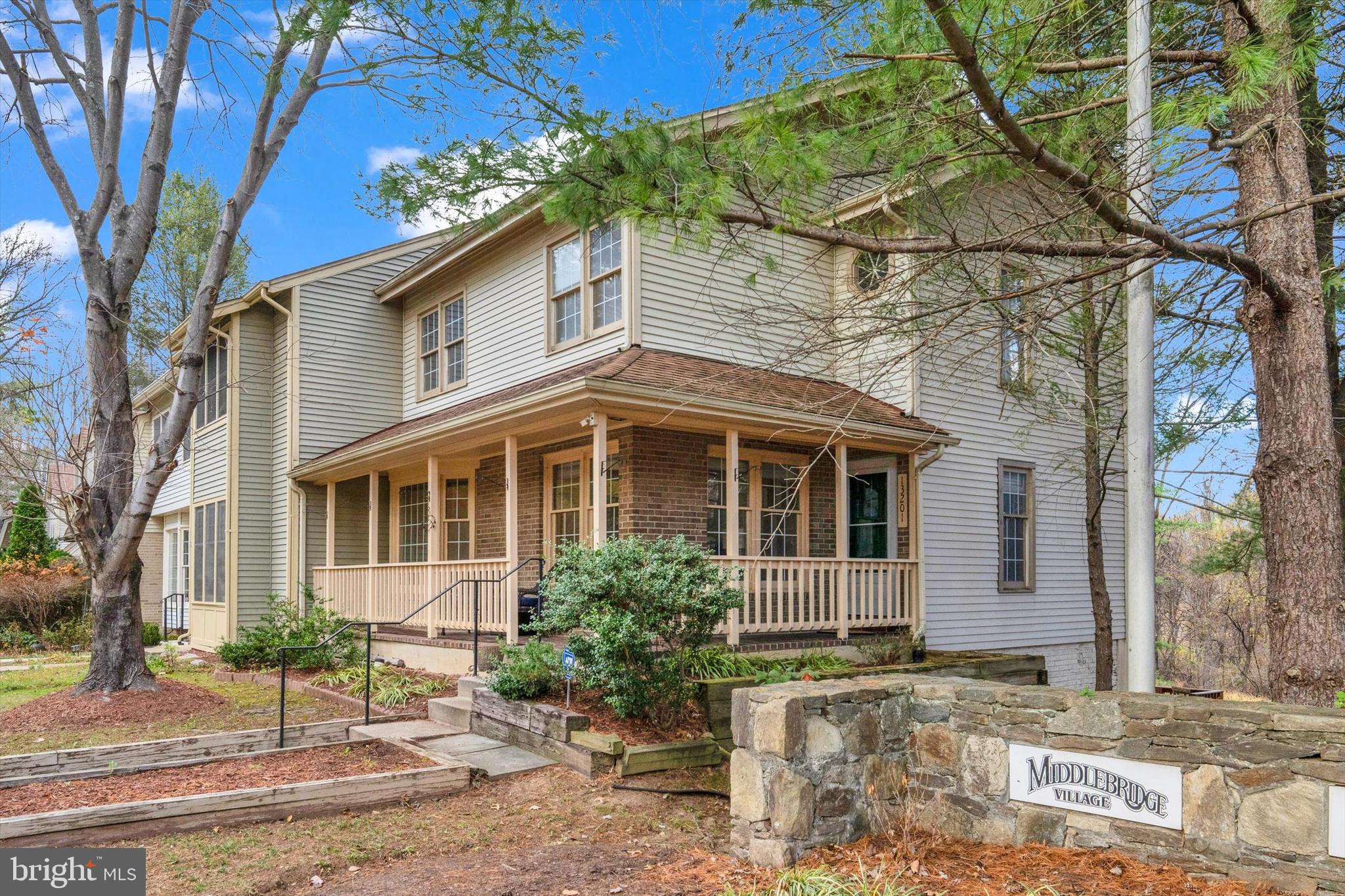 13201 Valley Bridge Court Silver Spring, MD 20906 - Photo 2 of 42 a house that has a tree in front of it