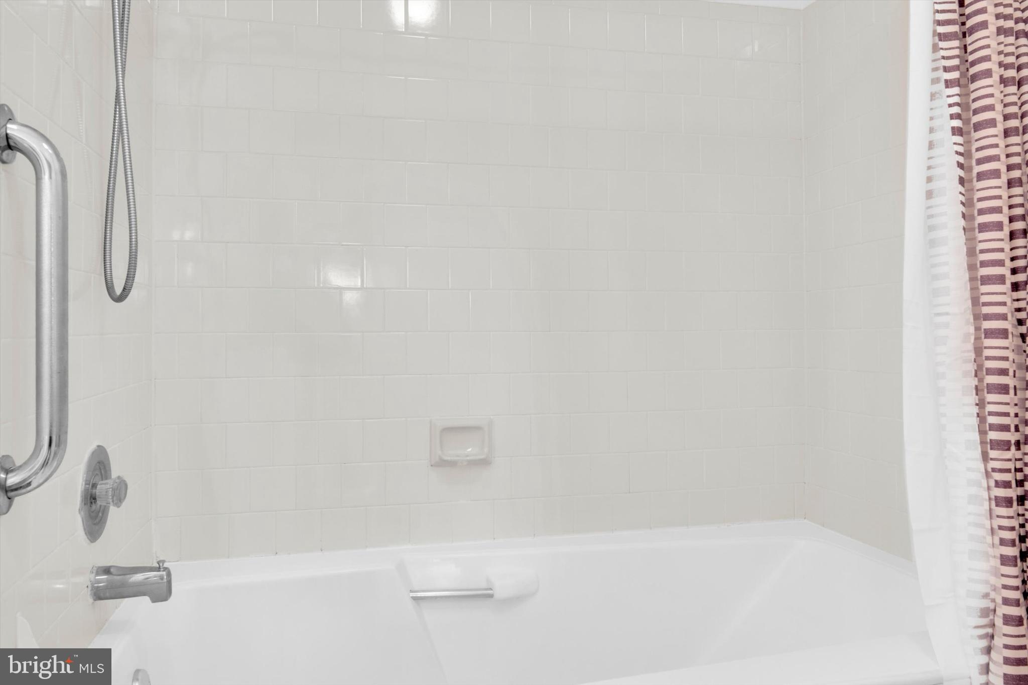 13201 Valley Bridge Court Silver Spring, MD 20906 - Photo 26 of 42 a bathroom with a shower