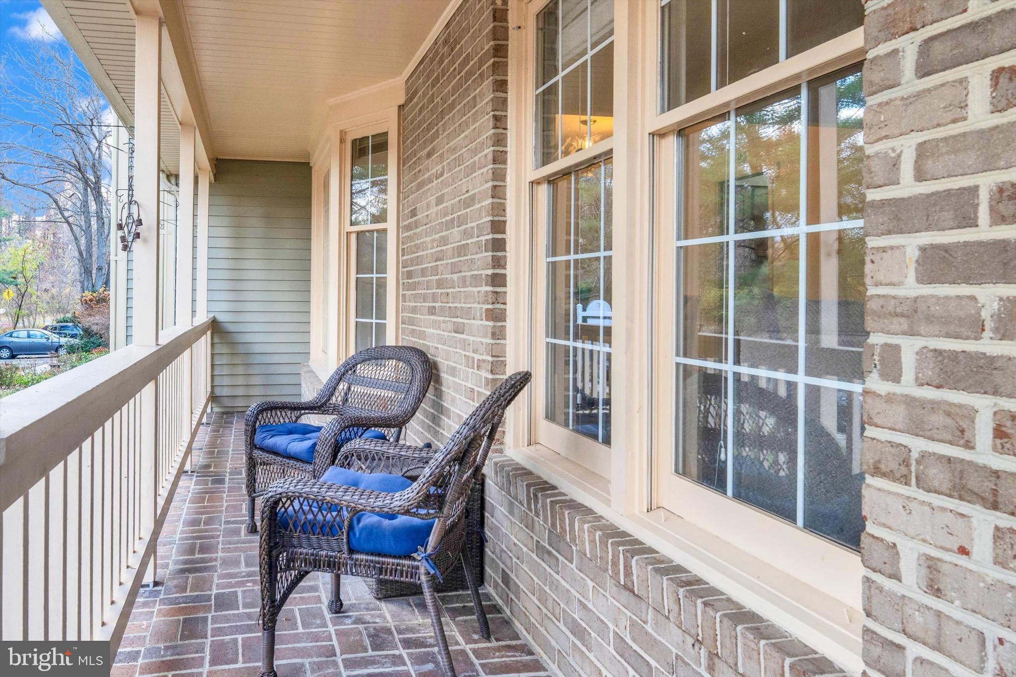 13201 Valley Bridge Court Silver Spring, MD 20906 - Photo 3 of 42 a view of a balcony with chair and the floor to ceiling window