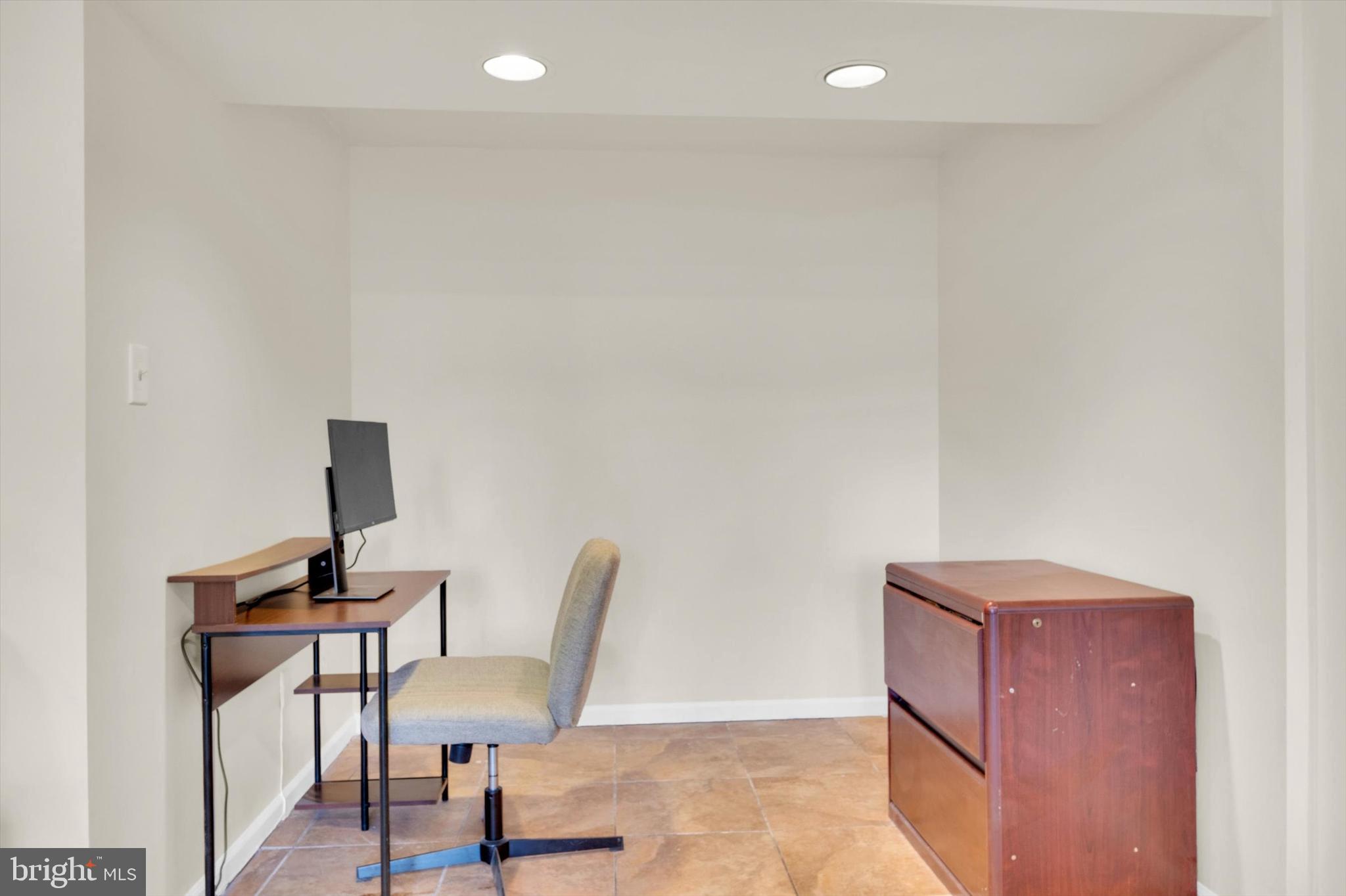 13201 Valley Bridge Court Silver Spring, MD 20906 - Photo 37 of 42 a view of a workspace with furniture