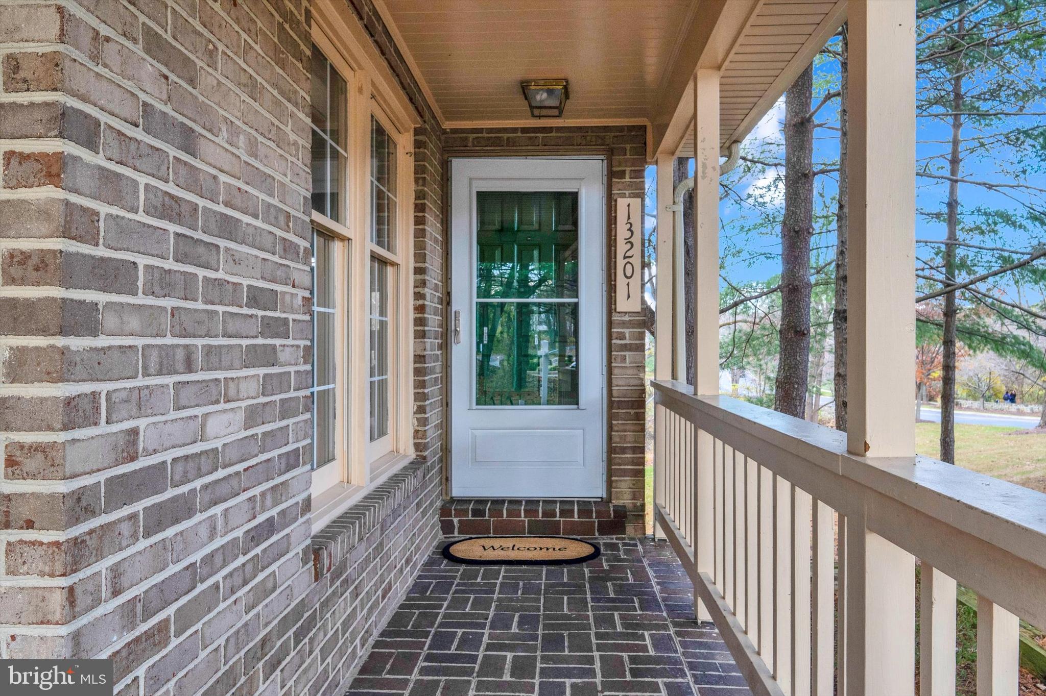 13201 Valley Bridge Court Silver Spring, MD 20906 - Photo 4 of 42 a view of a brick house with a window