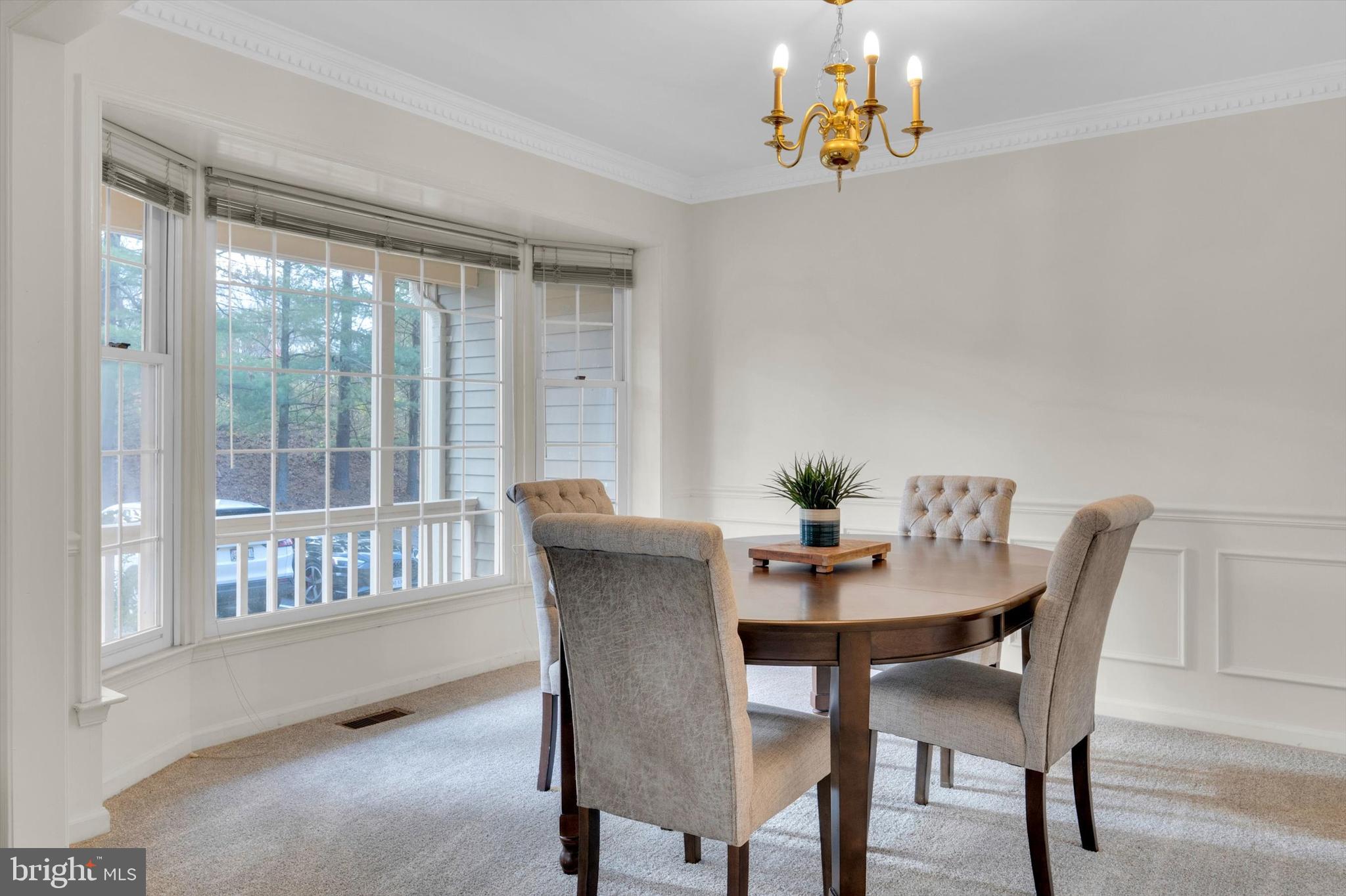13201 Valley Bridge Court Silver Spring, MD 20906 - Photo 10 of 42 a living room with furniture and a window