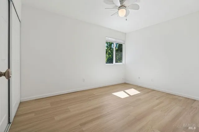 a view of small space with wooden floor