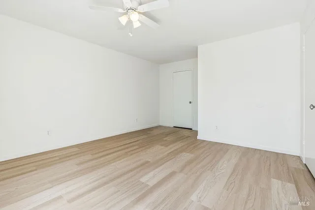 a balcony with wooden floor
