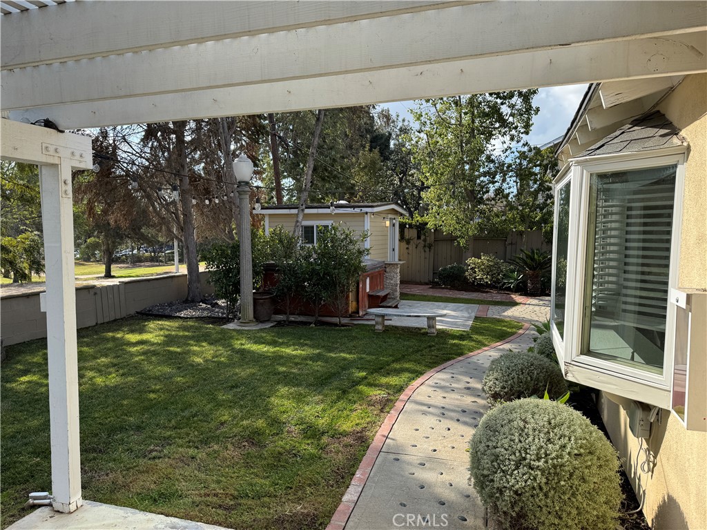 20182 Kline Drive Newport Beach, CA 92660 - Photo 27 of 39 a view of a chair and tables in the patio