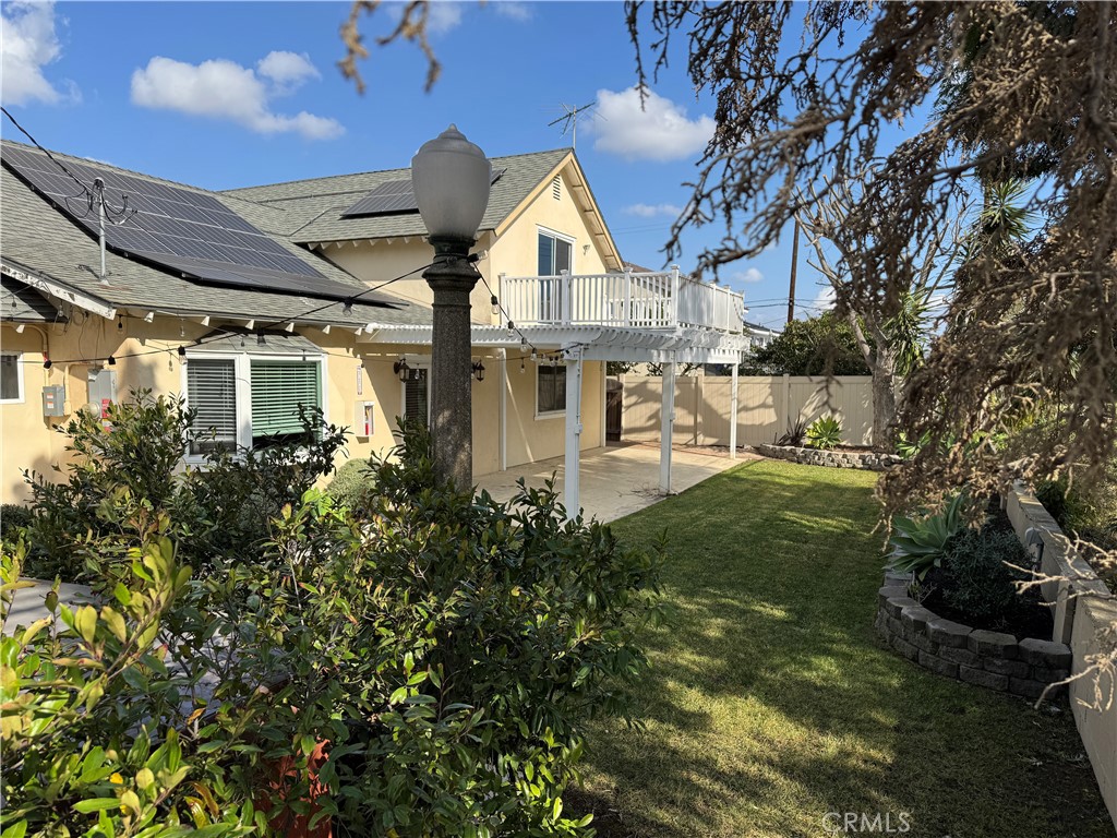 20182 Kline Drive Newport Beach, CA 92660 - Photo 36 of 39 a view of a house with a yard and potted plants