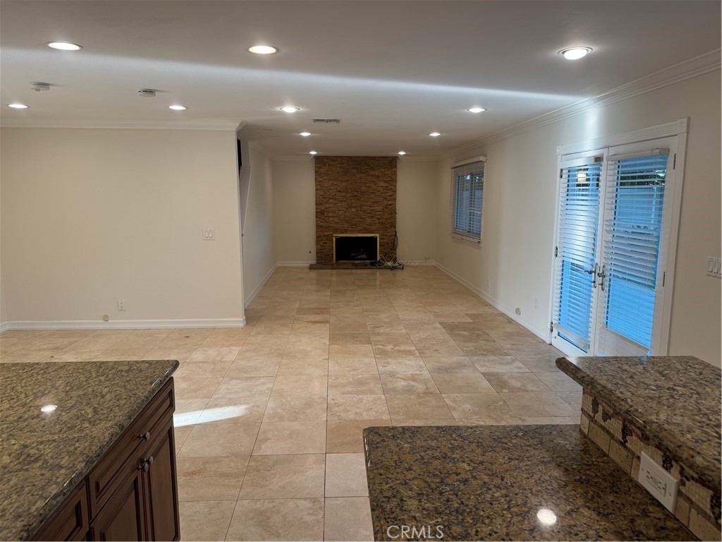 20182 Kline Drive Newport Beach, CA 92660 - Photo 8 of 39 a view of an empty room with a kitchen