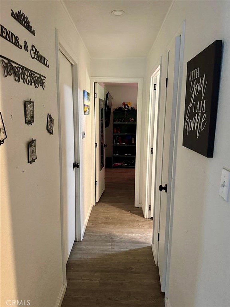 22601 Bear Valley Road, Unit 63 Apple Valley, CA 92308 - Photo 13 of 31 a view of a hallway with entryway door