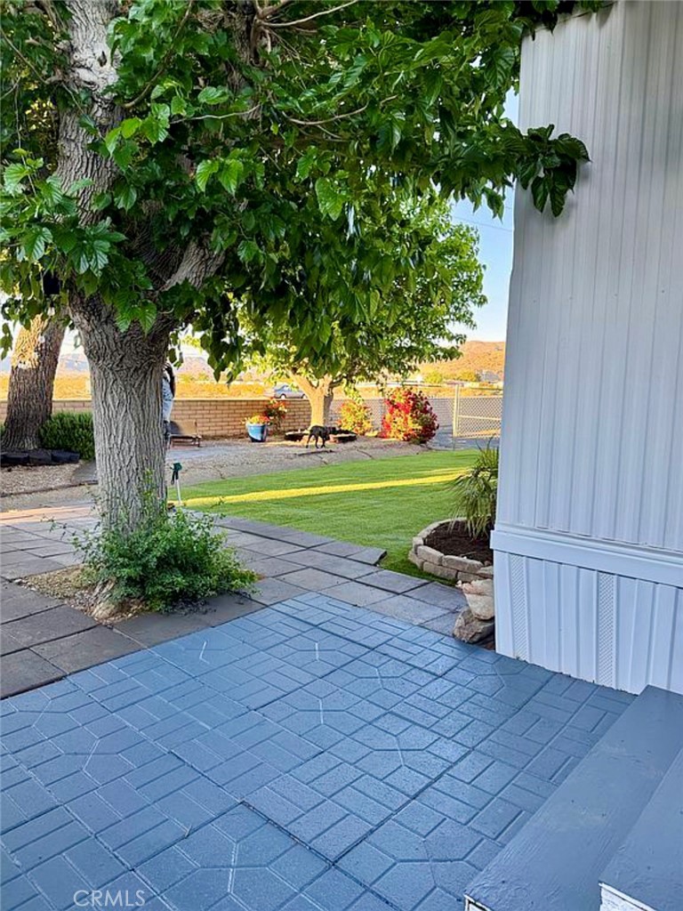 22601 Bear Valley Road, Unit 63 Apple Valley, CA 92308 - Photo 22 of 31 a view of outdoor space with garden and entertaining space