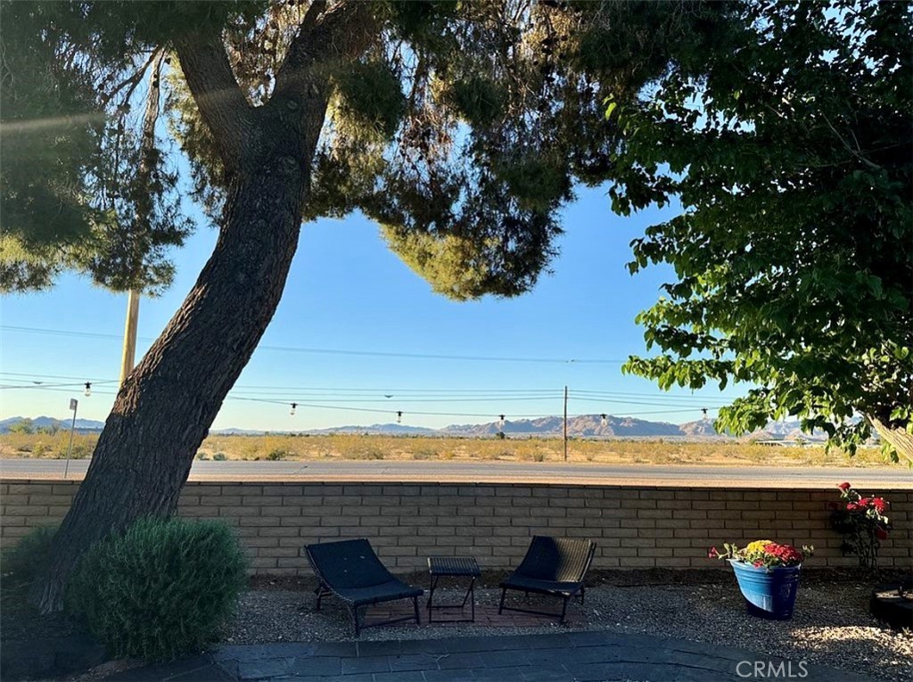 22601 Bear Valley Road, Unit 63 Apple Valley, CA 92308 - Photo 27 of 31 a view of outdoor space with lounge chair