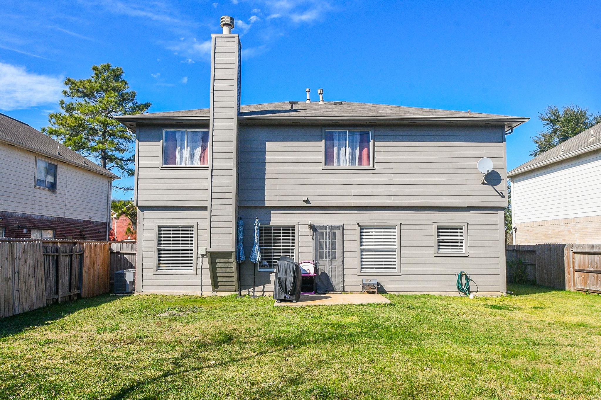 14407 Andrea Way Lane Houston, TX 77083 - Photo 26 of 29 a view of a house with a backyard
