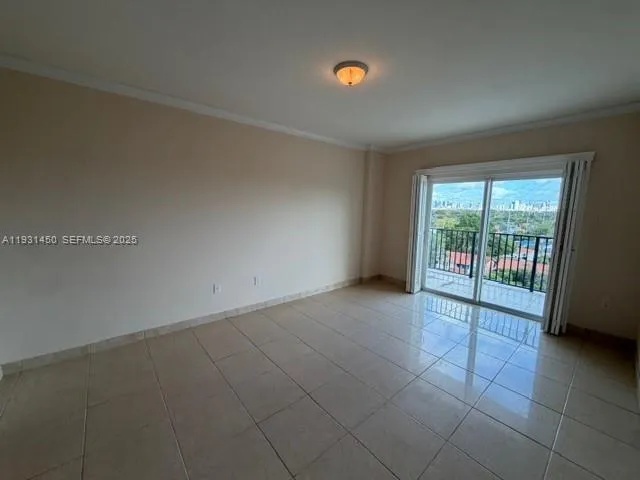 an empty room with windows and view