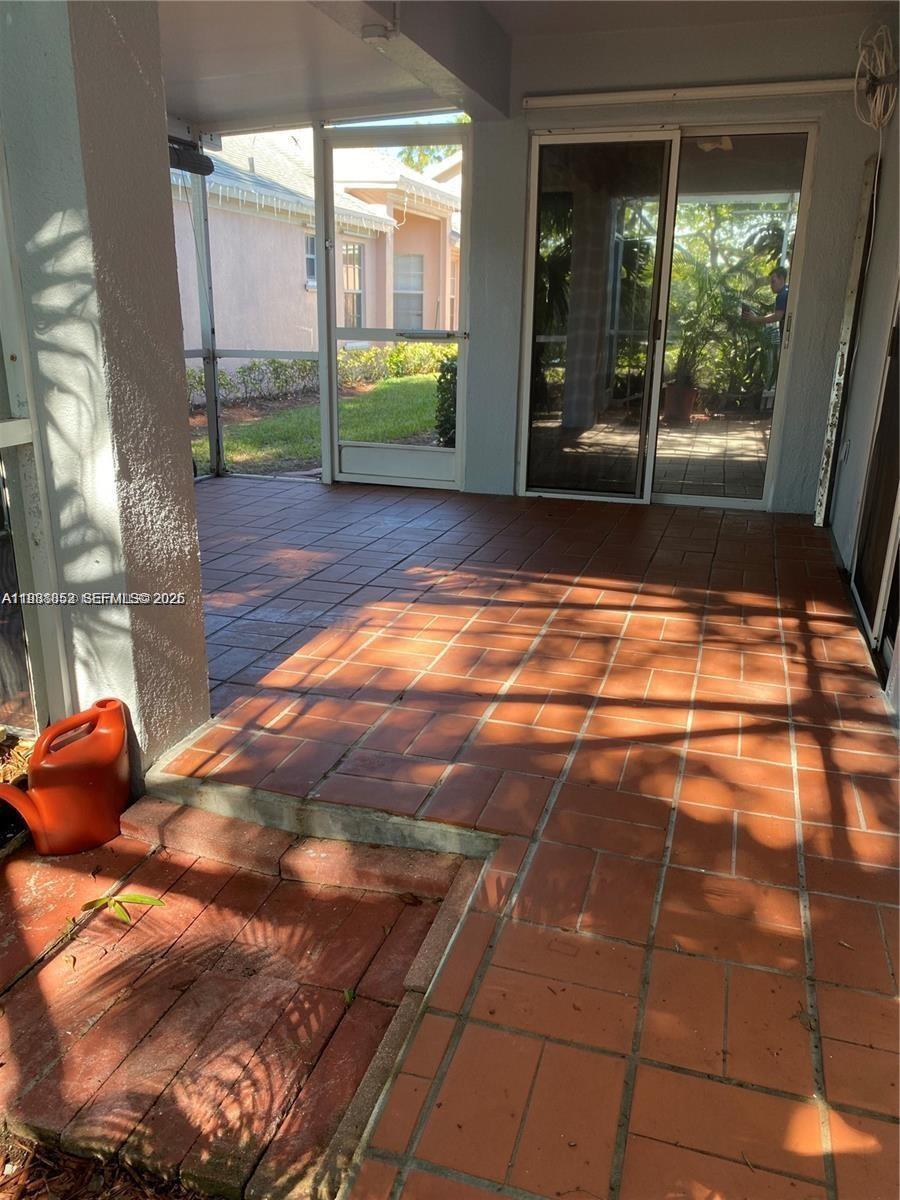 540 Southeast 21st Lane, Unit 540 Homestead, FL 33033 - Photo 9 of 14 a view of empty room with windows