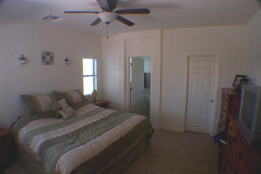 9953 West Chipman Road Tolleson, AZ 85353 - Photo 2 of 10 Master Bedroom