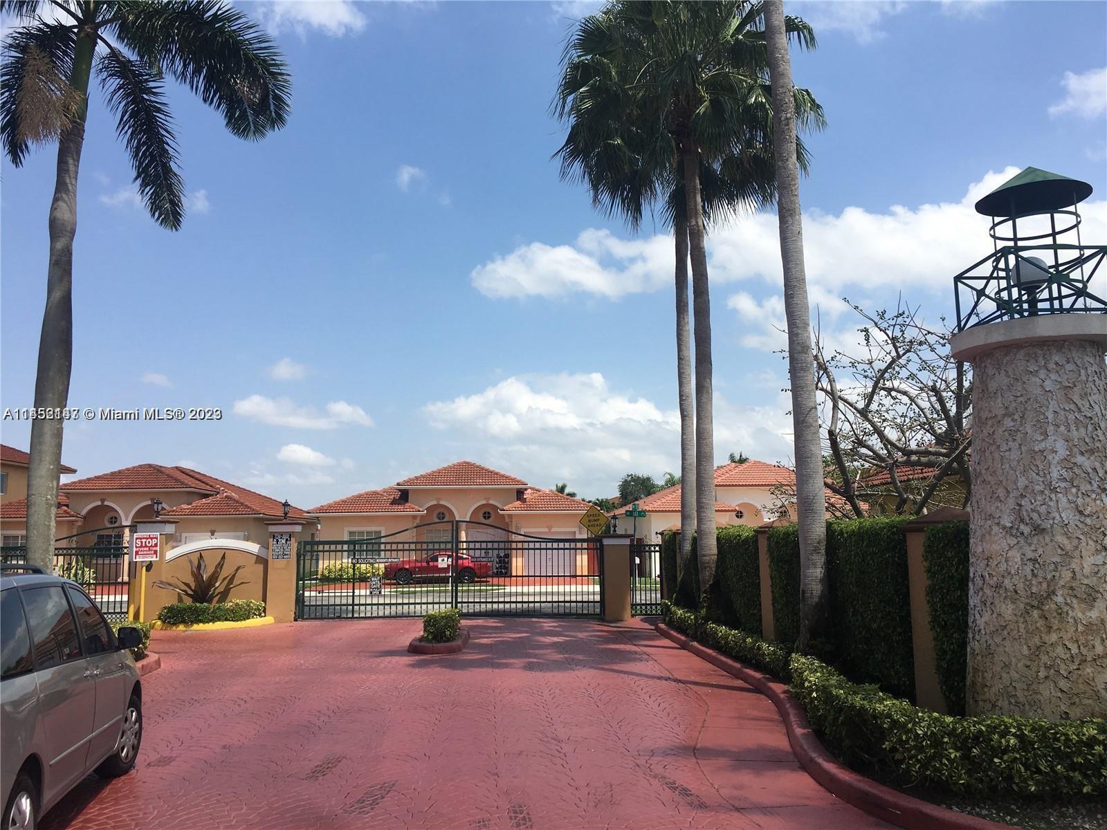 16124 Southwest 55th Terrace Miami, FL 33185 - Photo 1 of 23 a view of multiple houses with a street