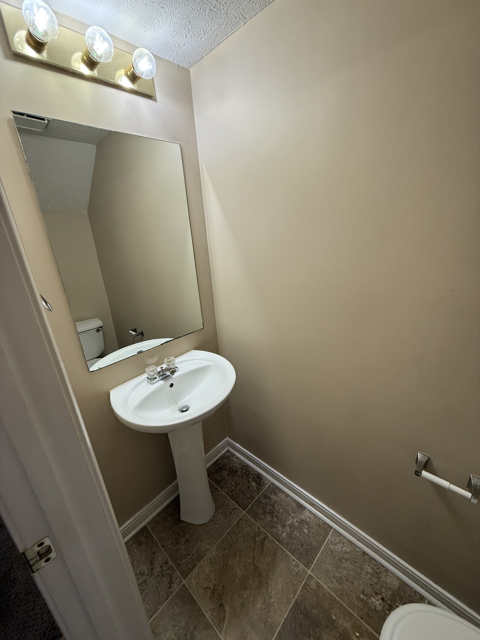 1040 Shaman Crossing Murfreesboro, TN 37128 - Photo 7 of 20 a bathroom with a sink and mirror