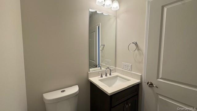 135 Cooper Road, Unit 1 Fishkill, NY 12524 - Photo 9 of 12 Bathroom featuring vanity and toilet