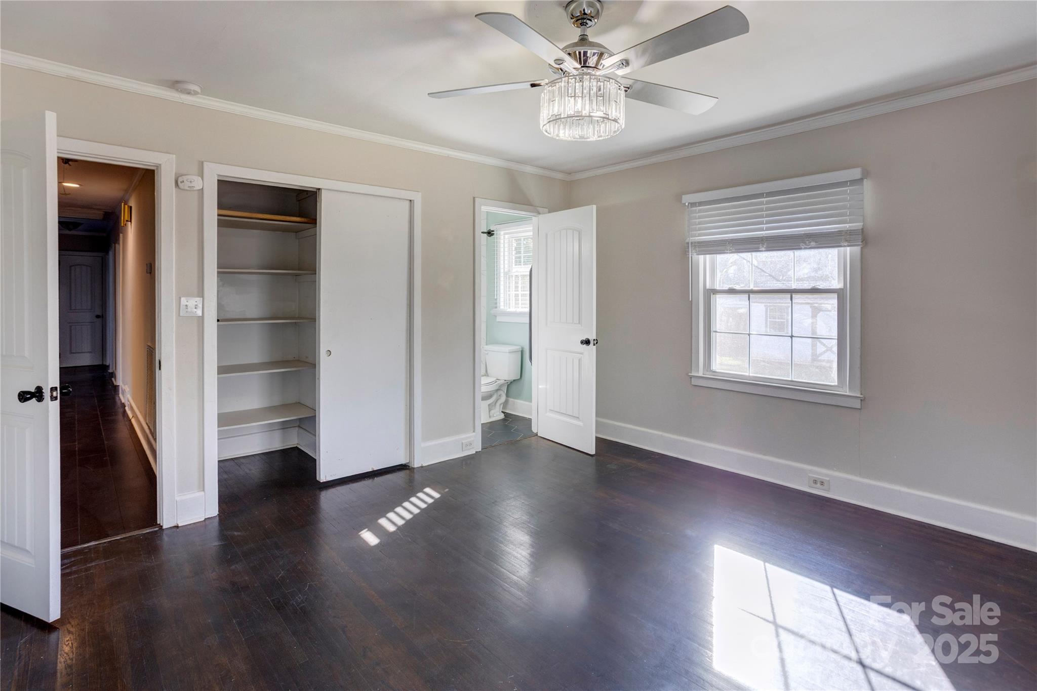 782 Union Street South Concord, NC 28025 - Photo 18 of 19 a view of an empty room with wooden floor and a window