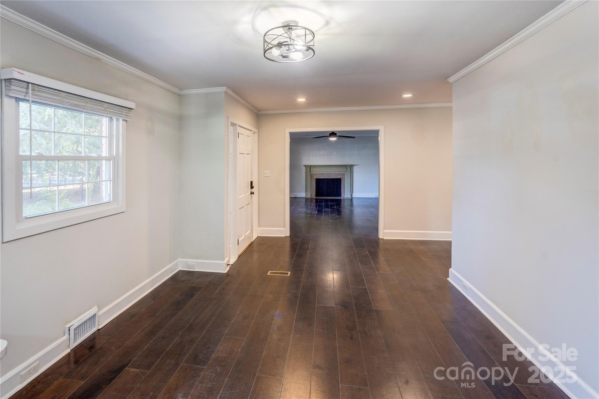 782 Union Street South Concord, NC 28025 - Photo 9 of 19 wooden floor in an empty room with a window