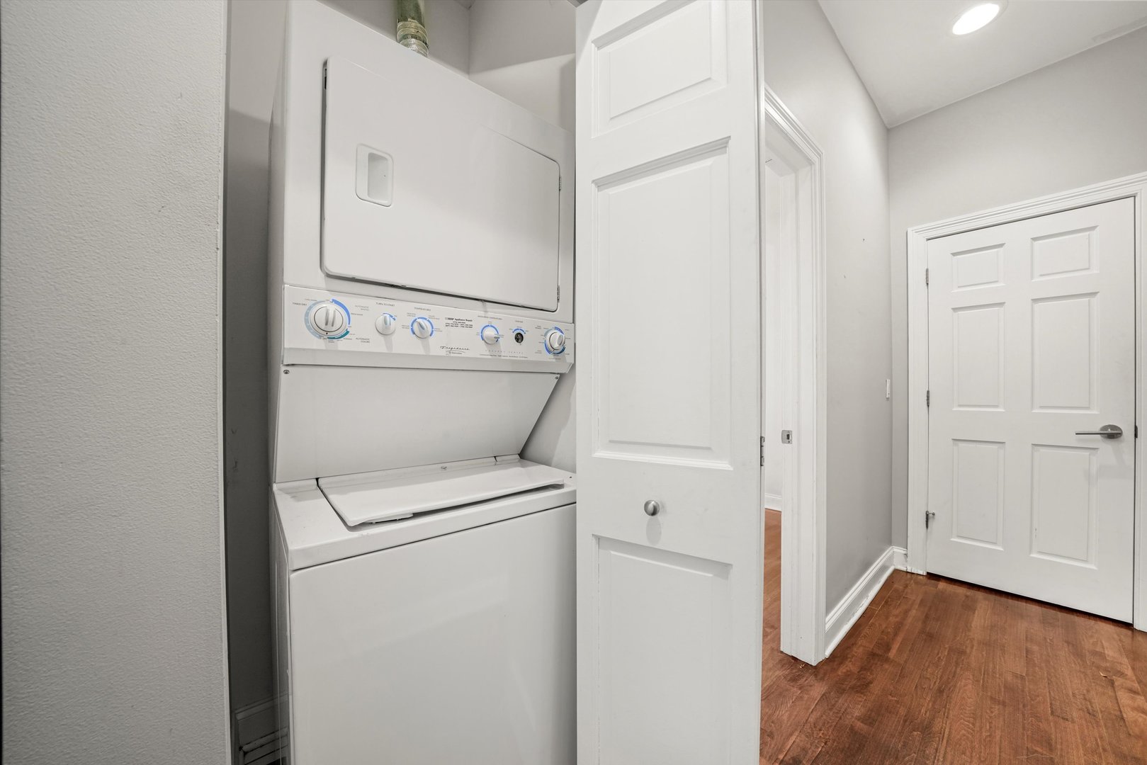 2430 West Iowa Street, Unit 3 Chicago, IL 60622 - Photo 17 of 21 a view of a storage & utility room with dryer and washer