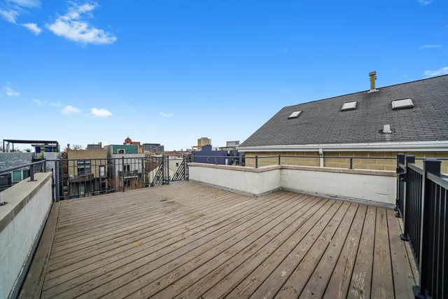 a view of a living room with furniture