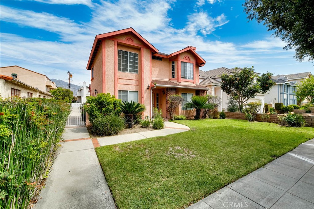 113 Diamond Street Arcadia, CA 91006 - Photo 3 of 24 a front view of a house with a yard