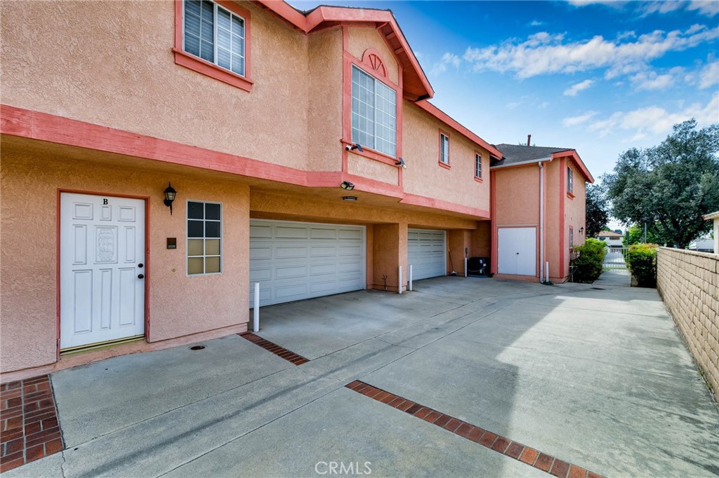 113 Diamond Street Arcadia, CA 91006 - Photo 5 of 24 a front view of a house with a garage
