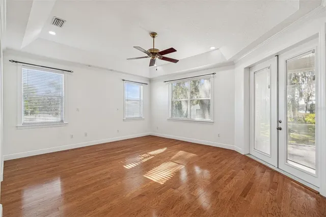 a bathroom with double sink and a mirror