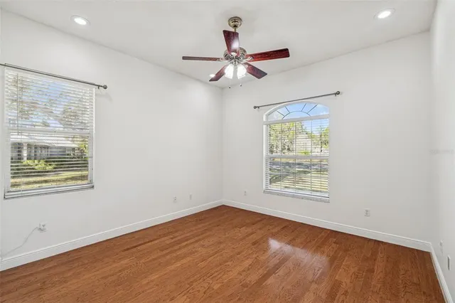 a bathroom with a double vanity sink mirror and shower