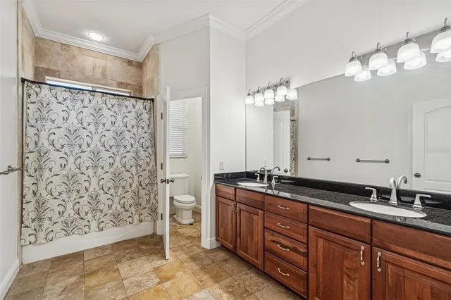 a room with furniture and a chandelier