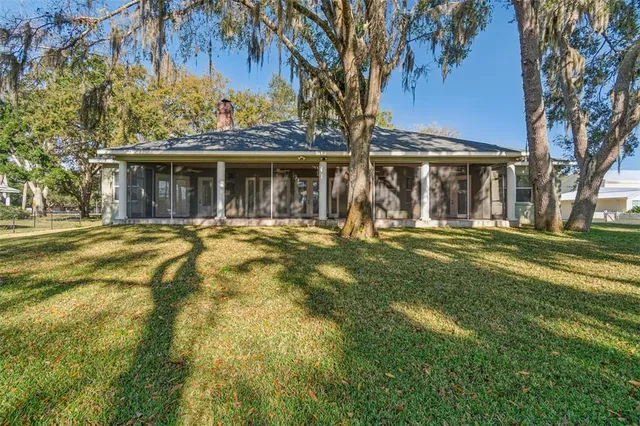 a view of balcony with wooden floor and fence
